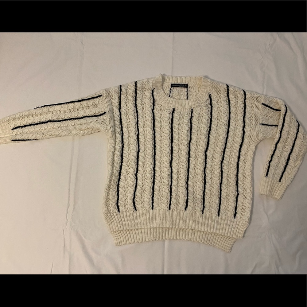 Atmosphere Cream and Black Sweater